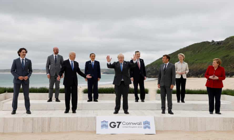 President of the European Union and G7 leaders from Canada, France, Germany, Italy, Japan, the UK and the US pose for a group photograph ahead of their meeting this weekend