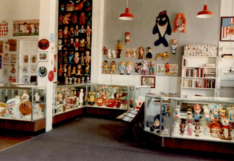room full of objects including poster of Starkist tuna mascot Charlie