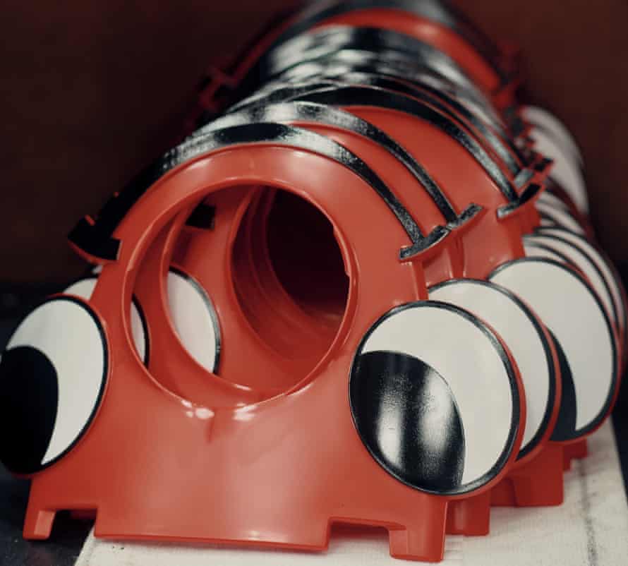 Freshly moulded and printed Henry the vacuum cleaner faces ready to be assembled