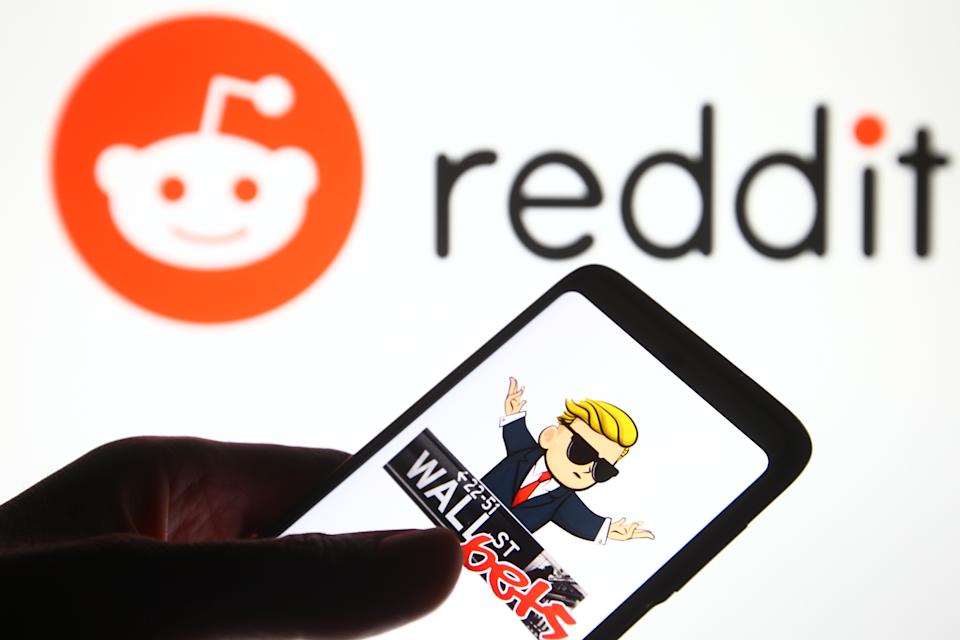 UKRAINE - 2021/02/08: In this photo illustration a WallStreetBets (WSB) logo of a subreddit where participants discuss stock and option trading is seen on a mobile phone screen in front of a Reddit logo. (Photo Illustration by Pavlo Gonchar/SOPA Images/LightRocket via Getty Images)