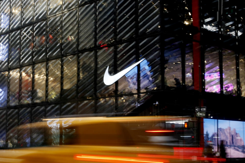 NEW YORK, NEW YORK - FEBRUARY 22: A Taxi crosses in front of the Nike store on February 22, 2021 in New York City. NIKE, Inc. (NYSE: NKE) will trade ex-dividend in the next days as NIKE's earnings have been almost flat over the past five years.  (Photo by John Smith/VIEWpress via Getty Images)
