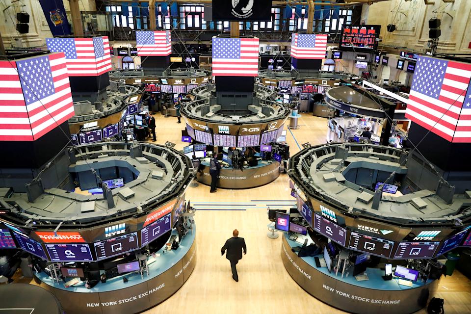 Traders work on the floor of the New York Stock Exchange shortly as coronavirus disease (COVID-19) cases in the city of New York rise, in New York, U.S., March 16, 2020. REUTERS/Lucas Jackson     TPX IMAGES OF THE DAY